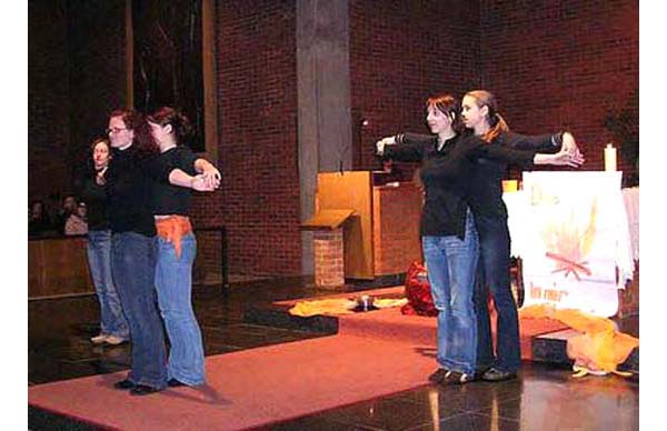 women parodying the Crucifixion